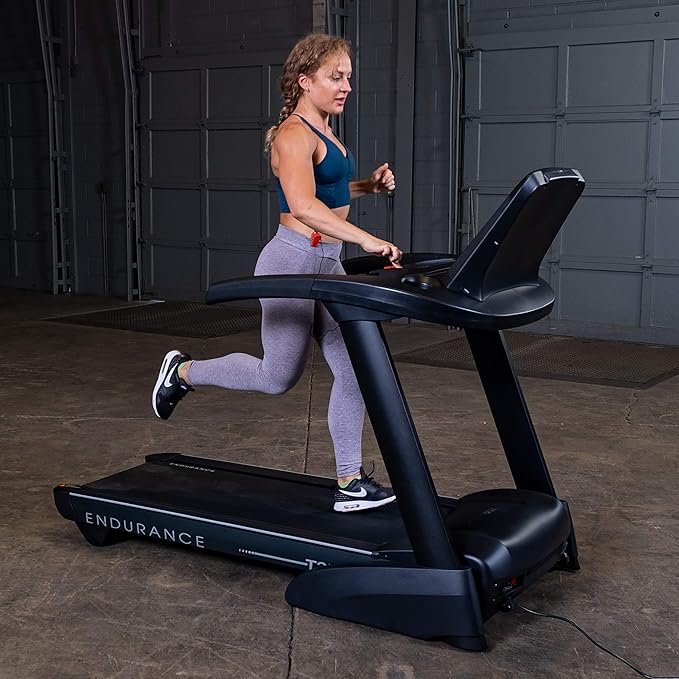 Body-Solid T25 Folding Treadmill - angled view showing compact design and handrails