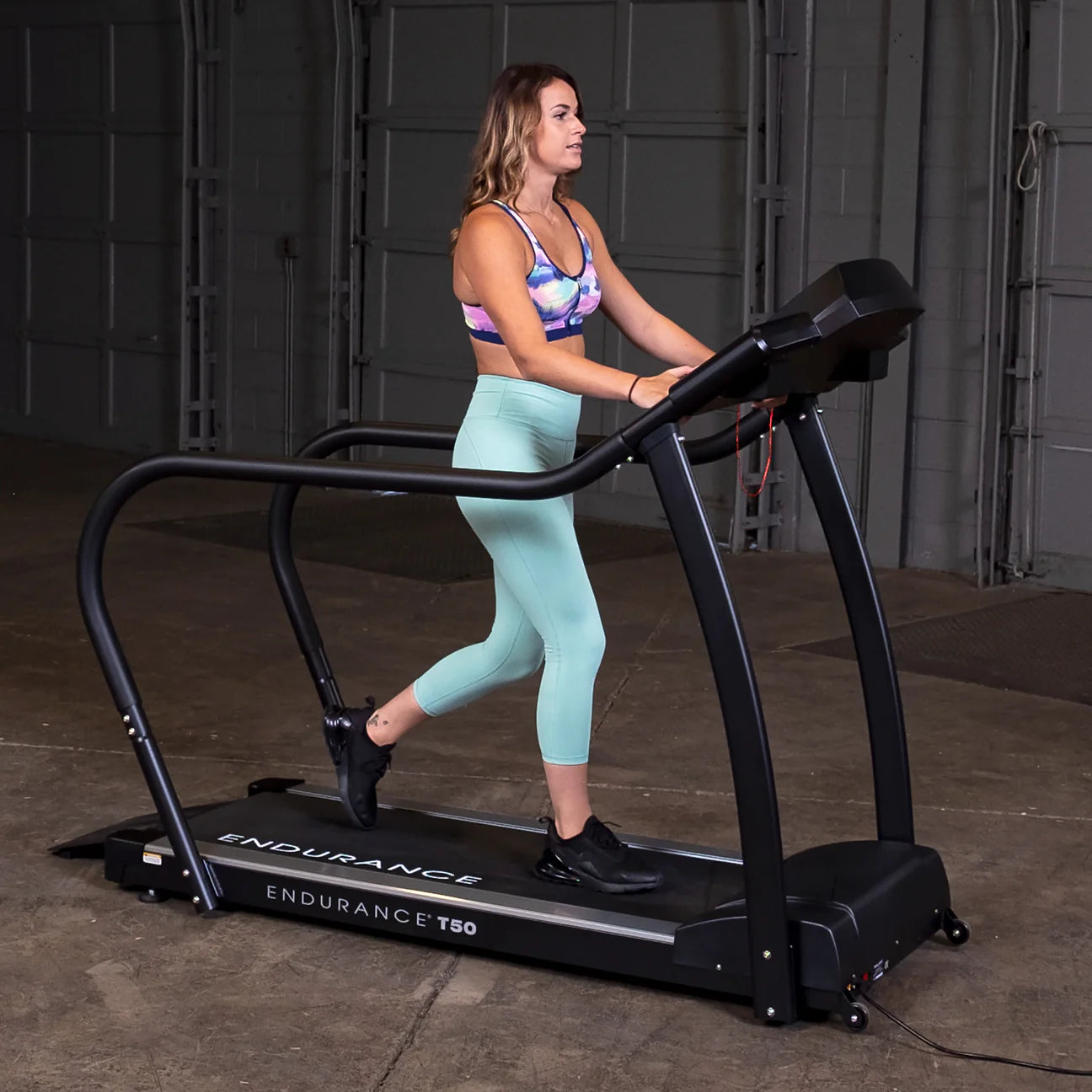 Body-Solid T50 Treadmill - front three-quarter view with advanced console display